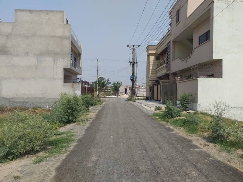 10 MARLA PLOT IN BLOCK A MOHLANWAL SCHEME HOT LOCATION BEST FOR END USER IN VERY CHEAP PRICE 40FT ROAD DIRECT ACCESS FROM DEFENCE ROAD OR CANAL ROAD 2