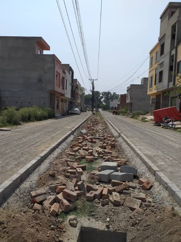 10 MARLA PLOT IN BLOCK A MOHLANWAL SCHEME HOT LOCATION BEST FOR END USER IN VERY CHEAP PRICE 40FT ROAD DIRECT ACCESS FROM DEFENCE ROAD OR CANAL ROAD 5