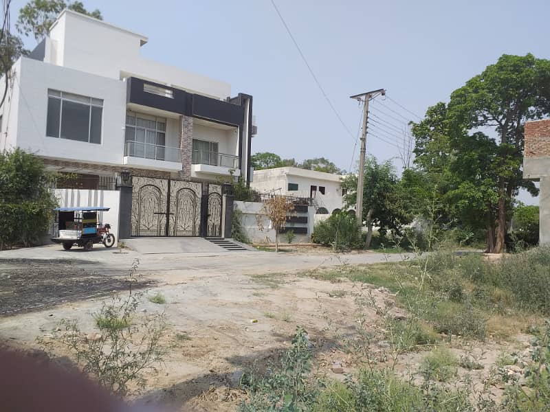 10 MARLA PLOT IN BLOCK A MOHLANWAL SCHEME HOT LOCATION BEST FOR END USER IN VERY CHEAP PRICE 40FT ROAD DIRECT ACCESS FROM DEFENCE ROAD OR CANAL ROAD 9