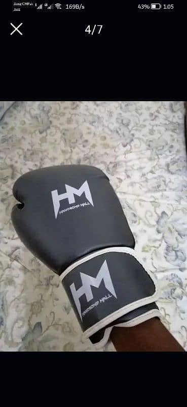 leather boxing bag with boxing gloves. 3