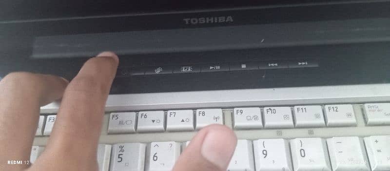 Toshiba laptop with charger. 12