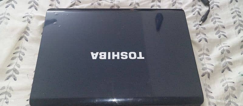 Toshiba laptop with charger. 17