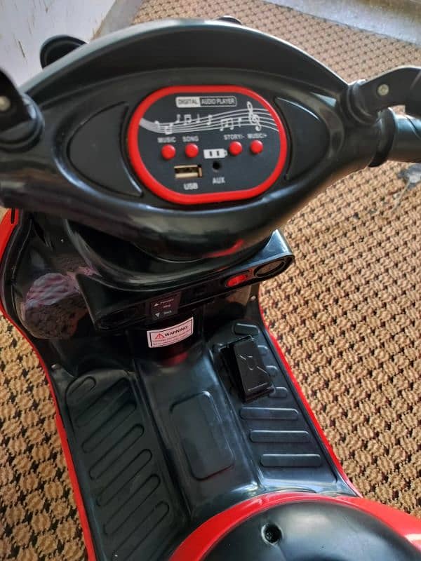 kids ride on chargeable bike scooter 1