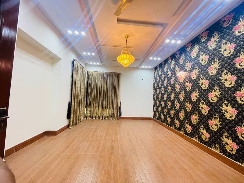 2 Kanal Facing Park Facing Canal Fully Furnished Triple Floor House with swimming pool, Mini Theater and Basement at the prime location of main Canal Road Babar Block, Bahria Town Lahore 44