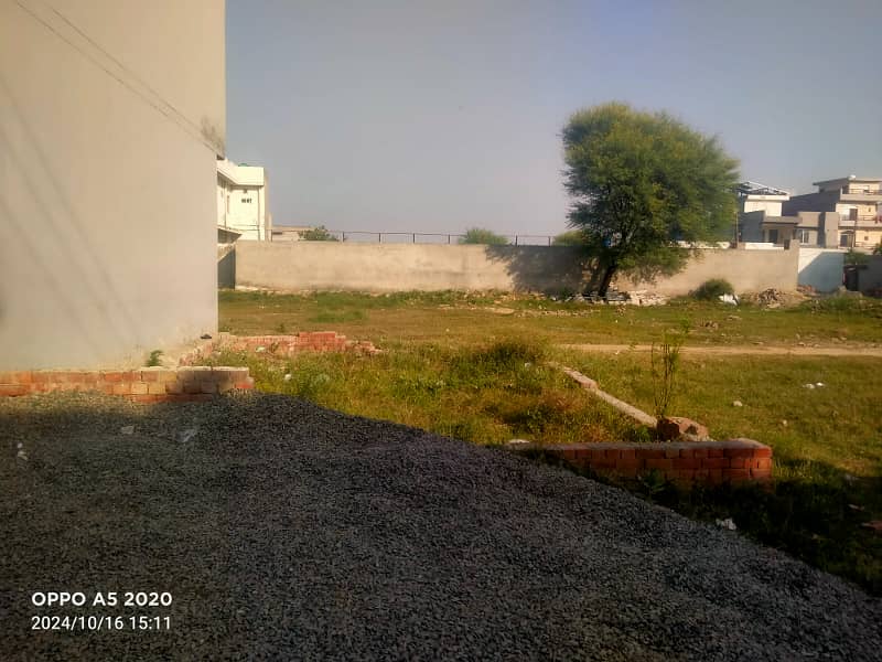 2.66 marla commercial plot available for sale in audit and account housing society phase 1 4