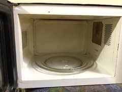 dawlance microwave up for urgent sale.