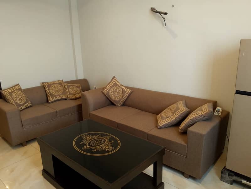 1 bedroom full furnished apartment for rent in sector C near to talwar chock and grand masjid bahria town lahore 1