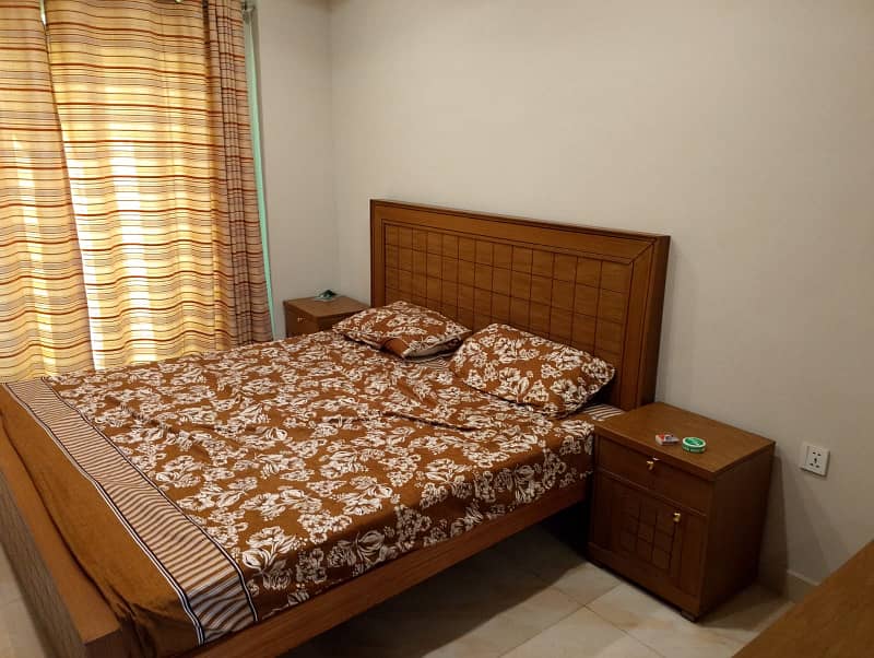 1 bedroom full furnished apartment for rent in sector C near to talwar chock and grand masjid bahria town lahore 2