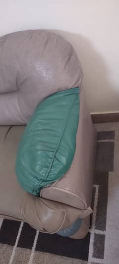 brown and green sofa