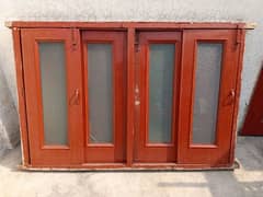 Wooden rack and wooden window with glass made bay deyar lakri