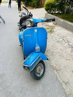 Vespa 2 stroke, made in Italy.