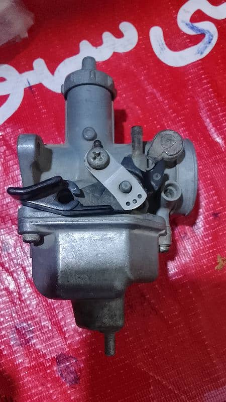 Honda 125 . . 12 model carburetor 1