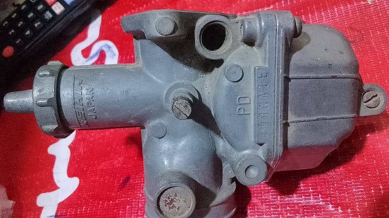 Honda 125 . . 12 model carburetor 3