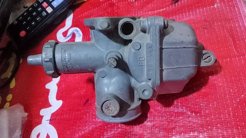 Honda 125 . . 12 model carburetor 4