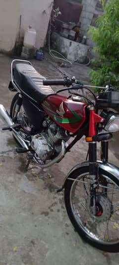 good bike good condition 10 by 10 Honda 125