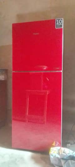 Hair refrigerator hrf 246 red glass door. 0