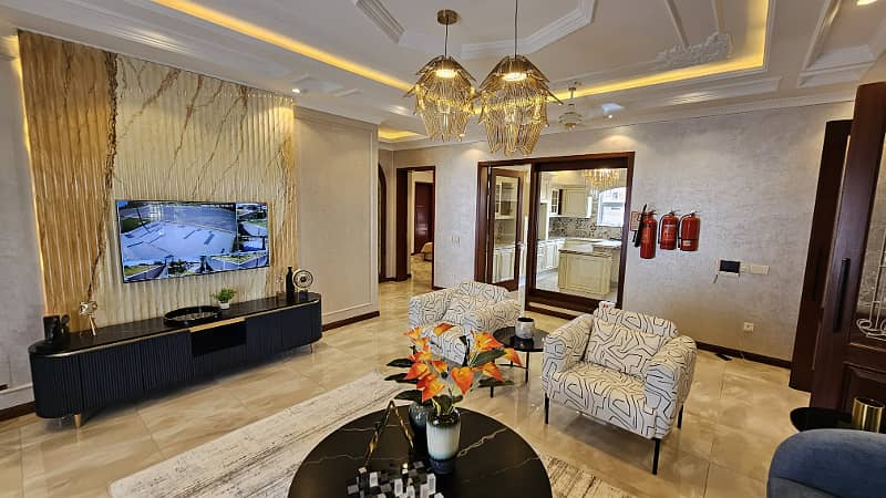 A Slice of Paradise: 1 Kanal Lavish Villa Fully Furnished with Premium Amenities in DHA Phase 7! 16