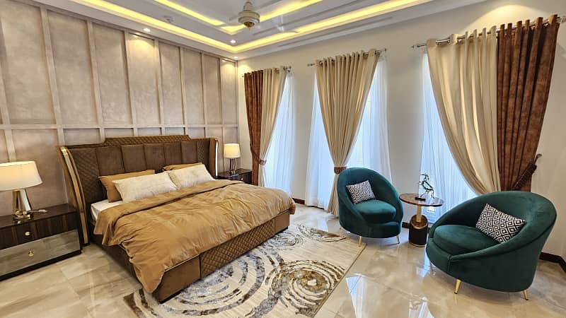 A Slice of Paradise: 1 Kanal Lavish Villa Fully Furnished with Premium Amenities in DHA Phase 7! 22