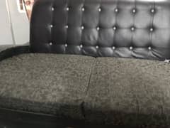 sofa black one seter