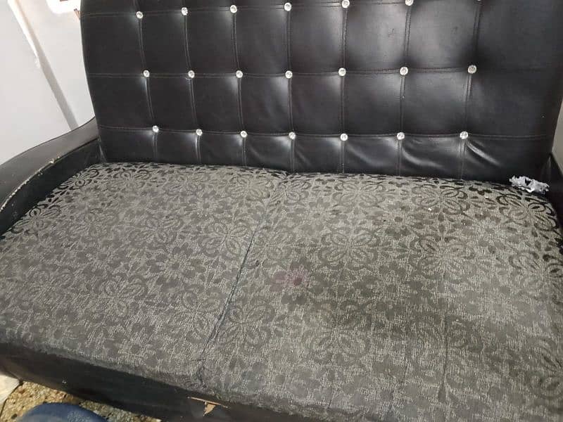 sofa black one seter 1