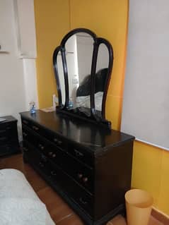 king bed with dressing table and bedside tables