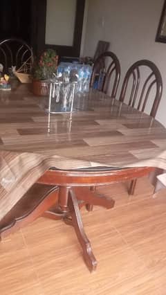 Good condition dining table with 5 chairs