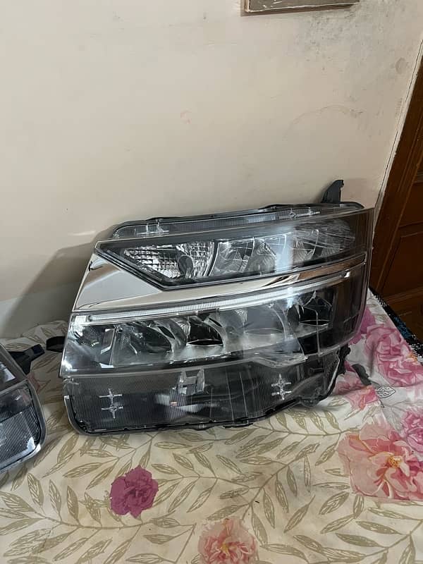 Daihatsu Move Custom 2019 to 2024 front headlights, left fender white 2