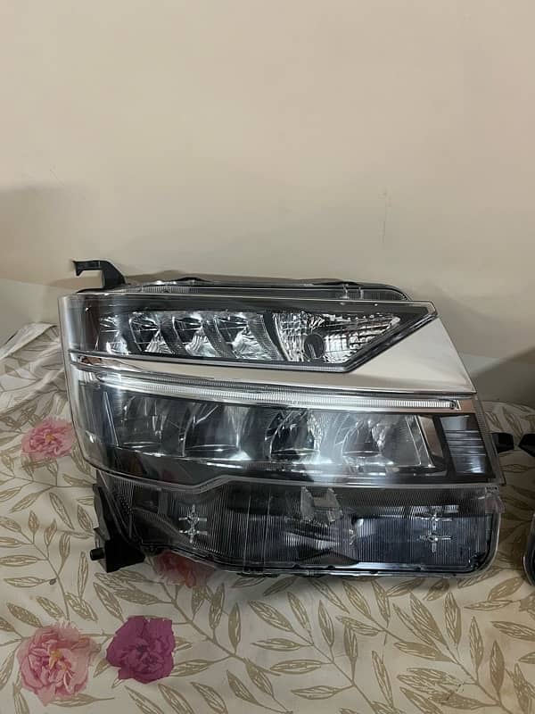 Daihatsu Move Custom 2019 to 2024 front headlights, left fender white 3