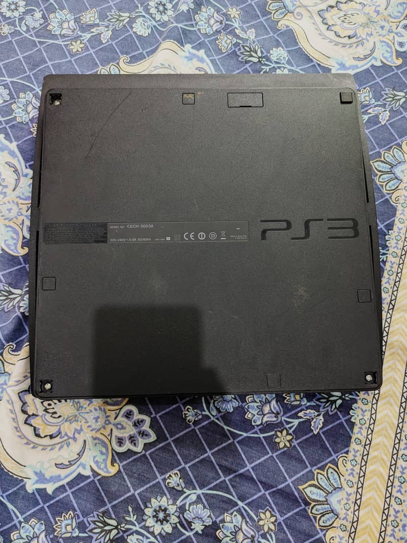 PS3 UK Original. with 6 Games CDs and 2 wireless controller. 3