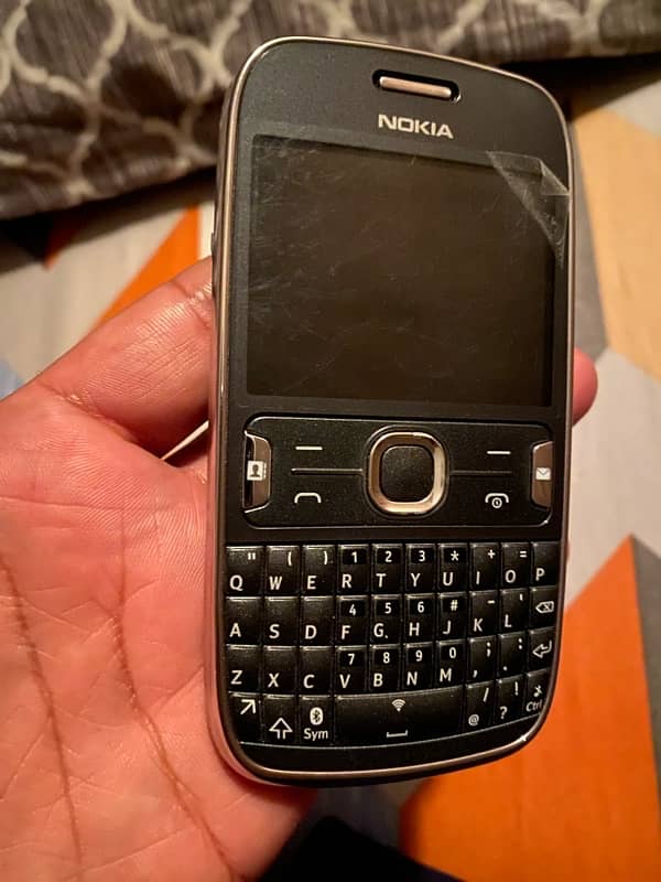 Nokia Asha 302 new condition forsale 1