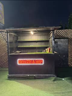 Food Cart With Neon Sign