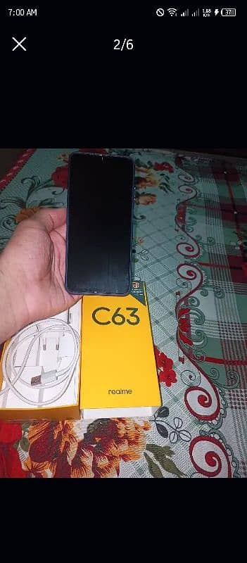 Realme c63  8+8 GB new condition 4 month use with box and accessories 1