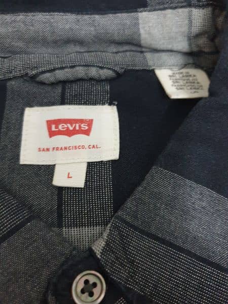 royal tag size new 16 and levis size L 2