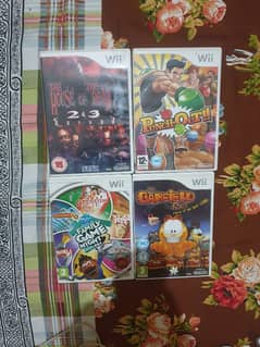 nintendo wii with 4 orignal games