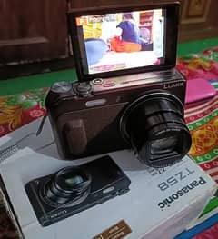 Panasonic Lumix DMC-TZ58, FHD 1080p, Wifi supported.