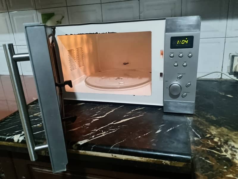 Imported grilled and microwave oven full functional excellent conditin 2