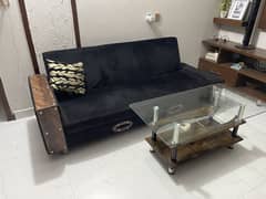 sofa cum bed with centre table