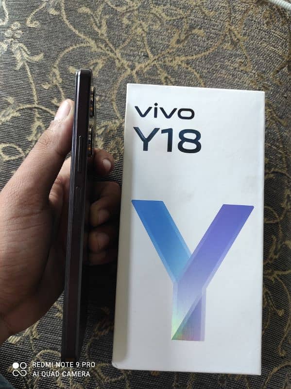 Vivo y18 6 128 with original box charger just 25 days used 2