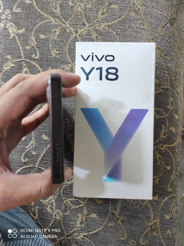 Vivo y18 6 128 with original box charger just 25 days used 4