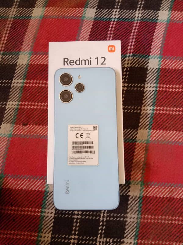 redmi12 8/128gb box lcd me white dots 101% ok 20hzr se km wala dor rhy 0