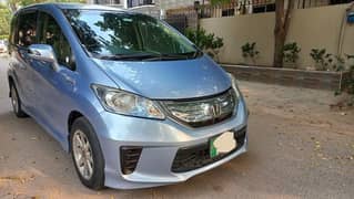 7 Seater , Hybrid 1.5 ,  Honda Freed