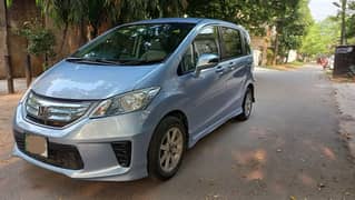 7 Seater , Hybrid 1.5 ,  Honda Freed