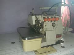 Overlooke Machine in Running Condition