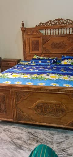 beautiful wodden bed with 2 side tables 0