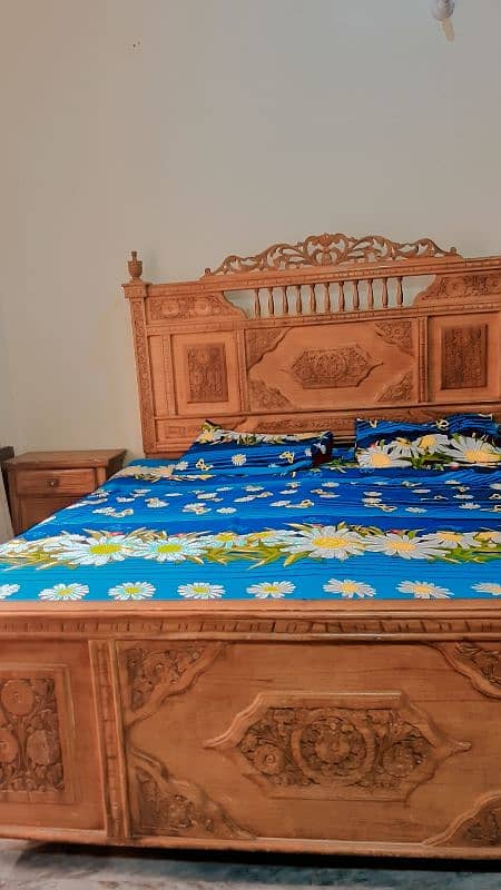 beautiful wodden bed with 2 side tables 3