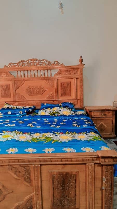 beautiful wodden bed with 2 side tables 6