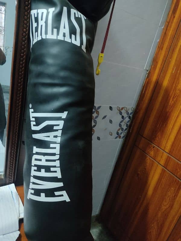 punching bag and gloves for sale almost like new good quality  4feet 0