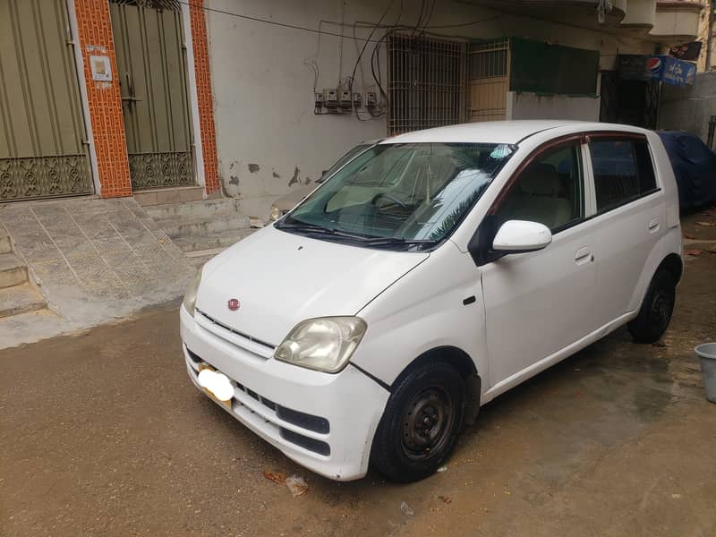 Urgent sale Mira 4 door 15