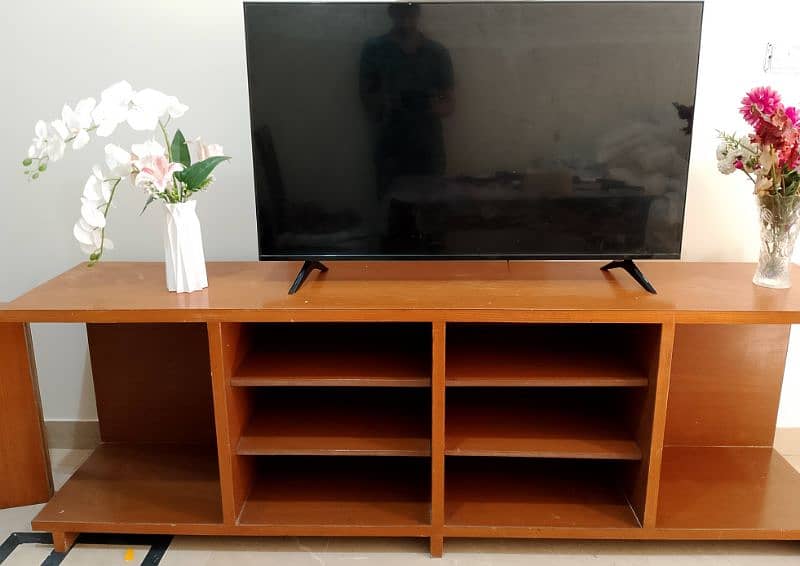 7 ft long TV console with 3 side shelves. 0