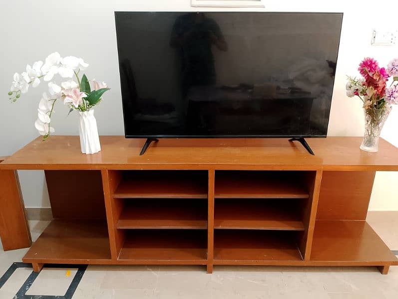 7 ft long TV console with 3 side shelves. 2